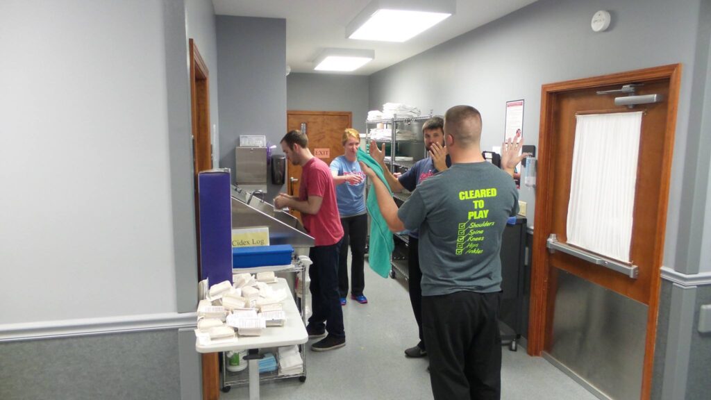 Scrub Lab participants washing up